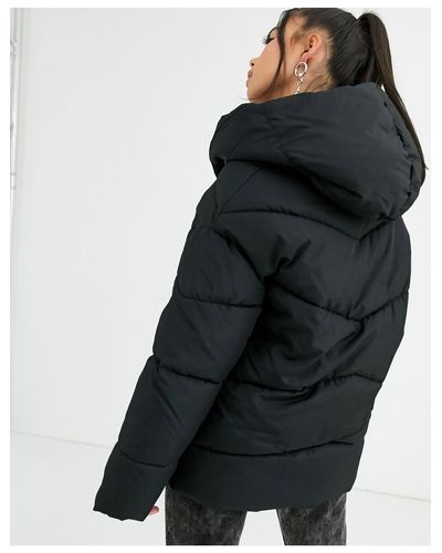 Bershka Synthetic Longline Puffer Coat With Hood in Black | Lyst