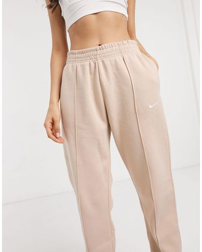 nike mini swoosh oversized joggers in 
