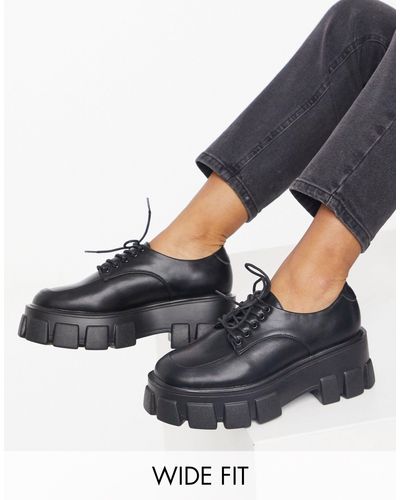 truffle collection wide fit chunky lace up boots in black