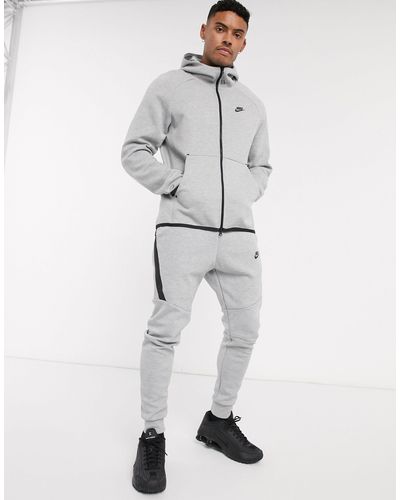 nike tech suit grey and black