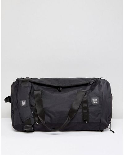 large herschel duffle bolsa