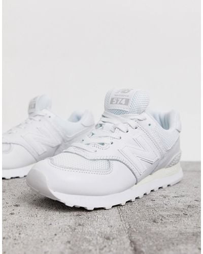 all white new balance trainers