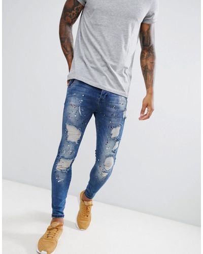 Jeans skinny a vita bassa blu scuro con stampa effetto schizzi di  verniceSIKSILK in Denim da Uomo colore Blu | Lyst