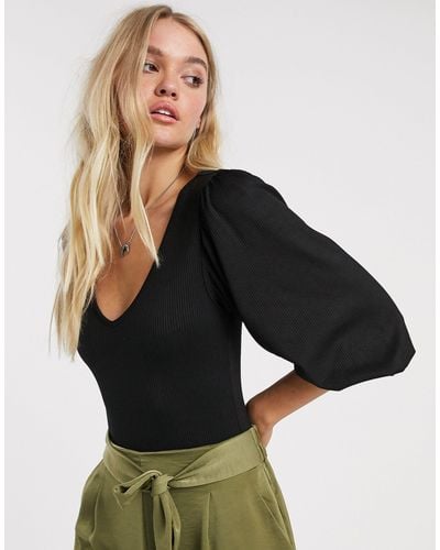 Body negro con mangas con volumen Stradivarius de Tejido sintético de color  Negro | Lyst