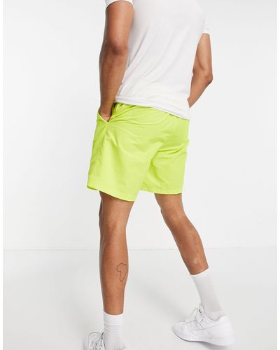 Pantaloncini con emblema, coloradidas Originals in Materiale sintetico da  Uomo colore Giallo | Lyst