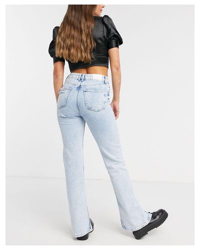 Bershka Jeans Met Split in het Blauw - Lyst