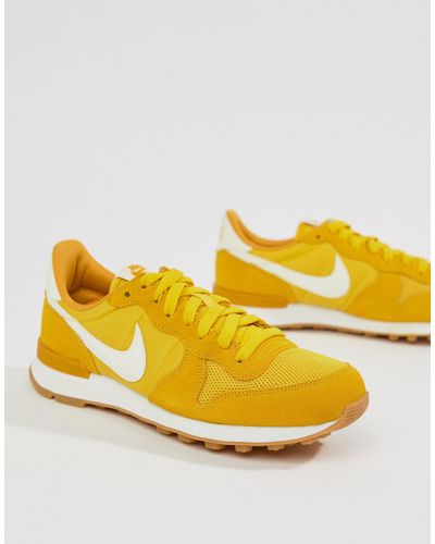 mens nike yellow trainers
