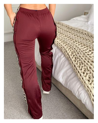 Wastoria - Pantaloni con bottoni rossi di Kappa in Rosso | Lyst