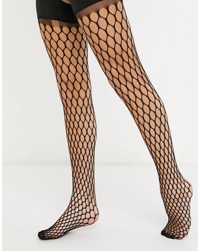 large scale fishnet tights
