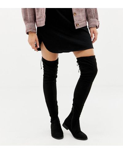 Botas planas altas hasta el muslo de caña muy ancha y ancho especial con  tachuelas Kaska ASOS de Denim de color Negro | Lyst
