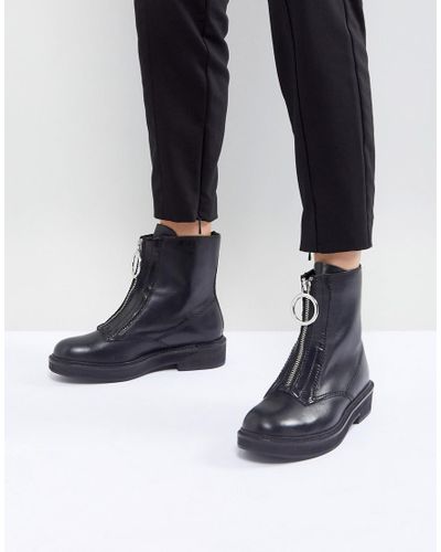 black zip front boots