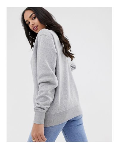 nike mini swoosh oversized cropped sweatshirt in gray