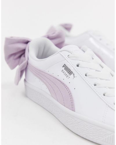 puma pink sneakers with bow