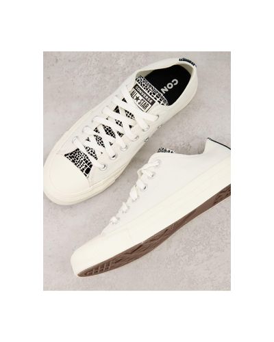 Chuck Taylor All Star - Baskets basses avec languette contrastante - cassé  Caoutchouc Converse en coloris Blanc - Lyst