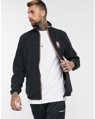 adidas originals adiplore polar fleece jacket in black