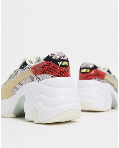 puma pulsar wedge trainers in metallic silver and pink
