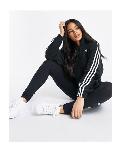 Sudadera polar negra con tres rayas, logo adicolor y cremallera adidas  Originals de Polar de color Negro | Lyst