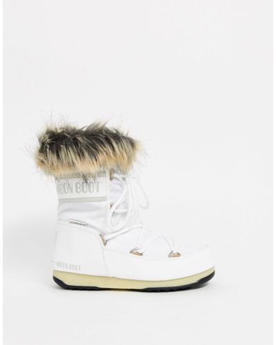 ash cuffed shearling wedge boot