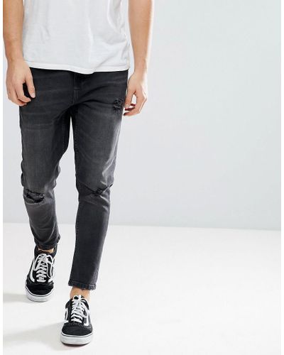 black tapered jeans