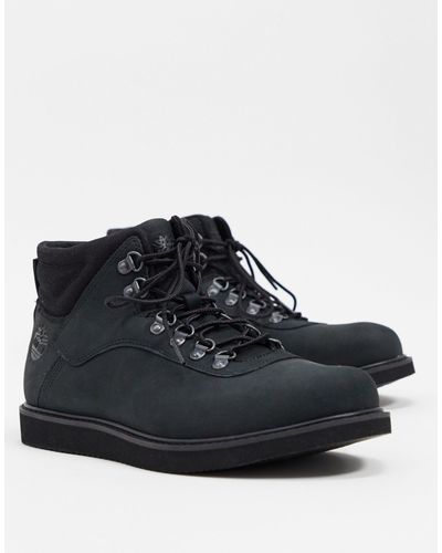 Botas bajas en negro Newmarket Arch Timberland de Lona de color Negro para  hombre | Lyst