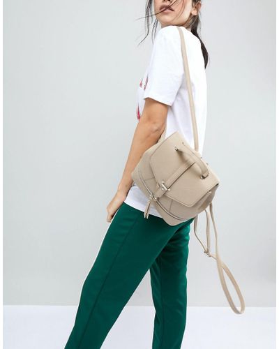 backpack with bottom zip compartment