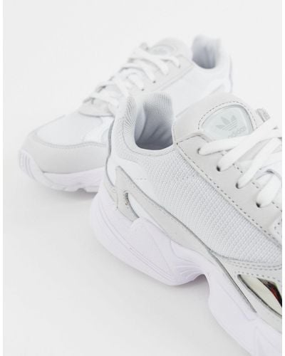 adidas originals triple white falcon trainers