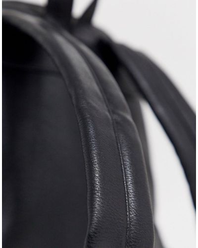 dune black quilted backpack