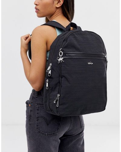 Zaino nero con zip e ciondolo a scimmia argento di Kipling in Nero | Lyst