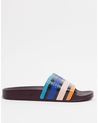 Chanclas con rayas desiguales adilette de adidas Originals de hombre de  color Azul | Lyst