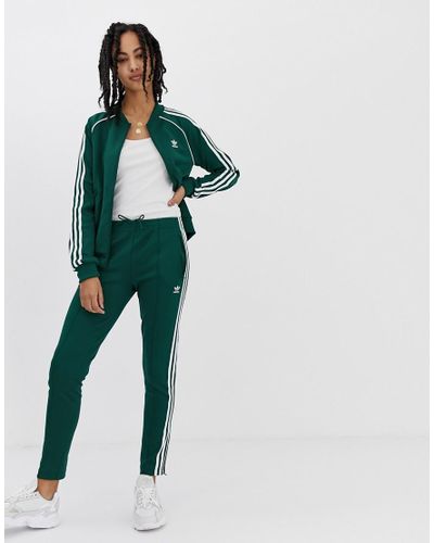 Adidas originals - pantaloni sportivi ampi con tre strisce rosa tie-dye asos  pantaloni felpa rosa - Stileo.it