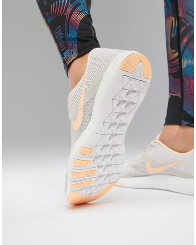 Nike Flex Sneakers In Grey With Peach Swoosh in Grey - Lyst