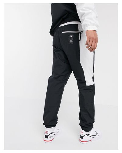 nike air cuffed woven joggers in grey