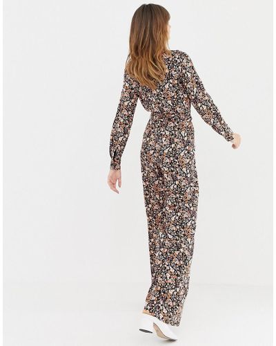 Mono largo con estampado de florecitas y detalle de cinturón Stradivarius  de Denim | Lyst