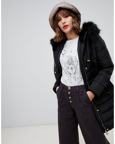 Plumífero largo Stradivarius de color Negro | Lyst