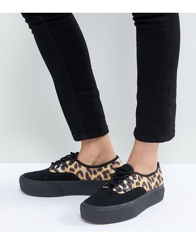 black cheetah platform vans