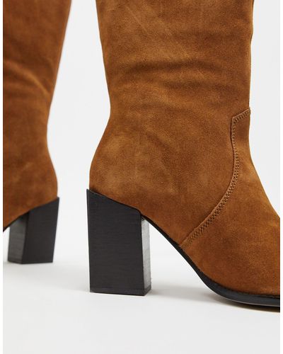brown high leg boots
