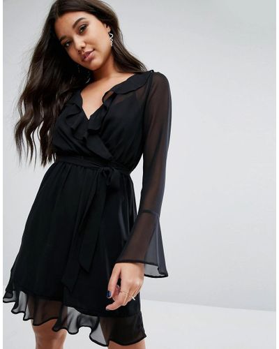 Lipsy Chiffon Ruffle Wrap Dress With Fluted Sleeve in Black | Lyst UK