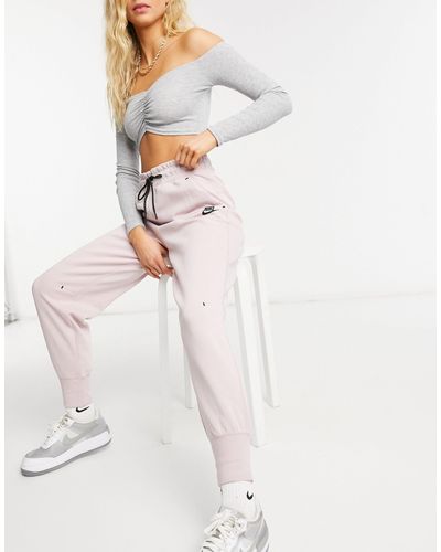 pink nike tech suit