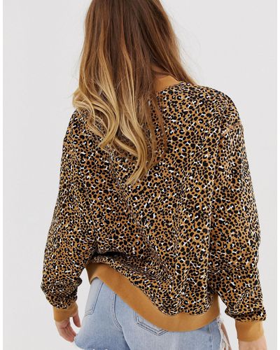 nike cheetah print sweater