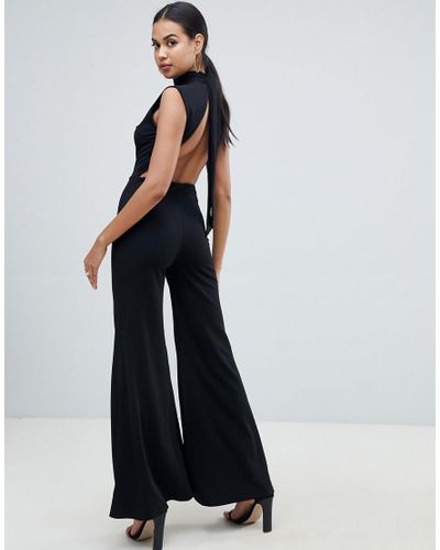 Tuta jumpsuit con fondo ampio e schiena scoperta con allacciatura di Club L  London in Nero | Lyst