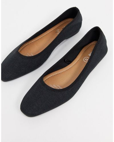 black patent ballerinas