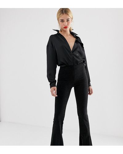 Stradivarius Denim Flare Broek Met Glitter in het Zwart | Lyst NL