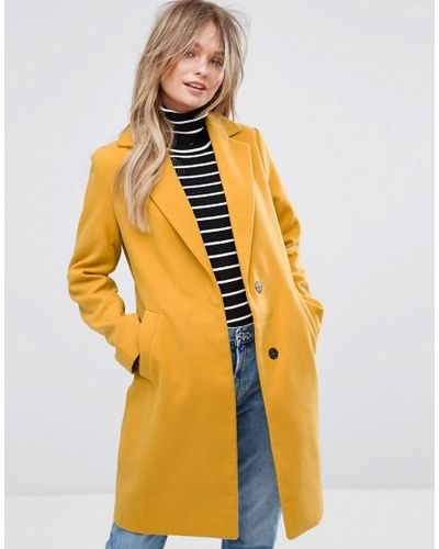 dark yellow coat