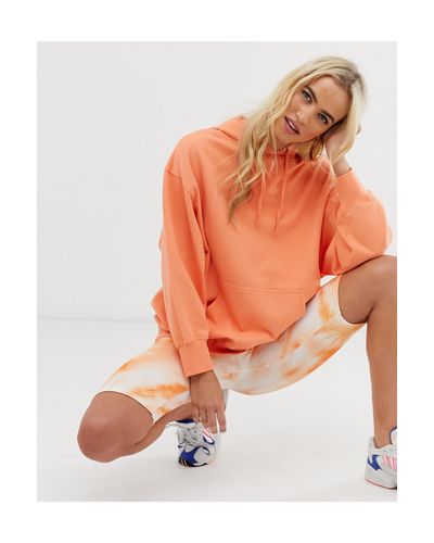 orange sweatshirt and sweatpants