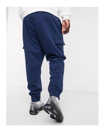 nike club essentials woven cargo joggers in navy
