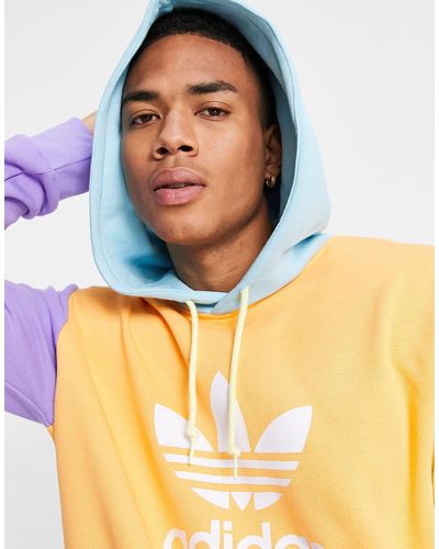 Sudadera con capucha naranja con diseño color block y trébol adidas  Originals de Algodón de hombre | Lyst
