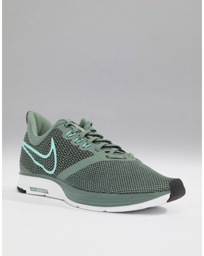 nike zoom strike trainers
