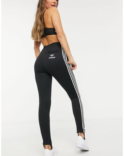 Leggings con ghette e tre strisce neri di adidas Originals in Nero | Lyst