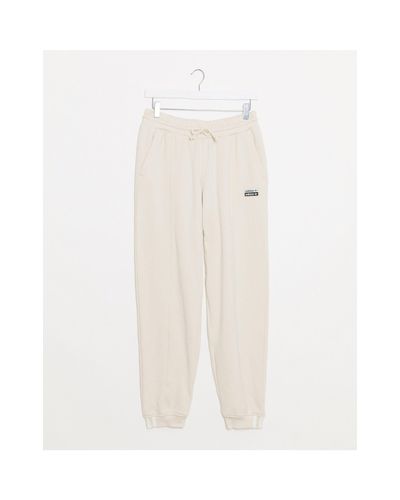 white cuffed sweatpants