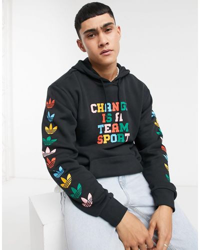 Sudadera con capucha en negro Change is a team sport Superstar adidas  Originals de hombre de color Negro | Lyst